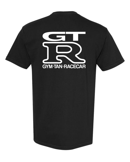 Back of black t-shirt with "GT R GYM•TAN•RACECAR" big in white, on white background
