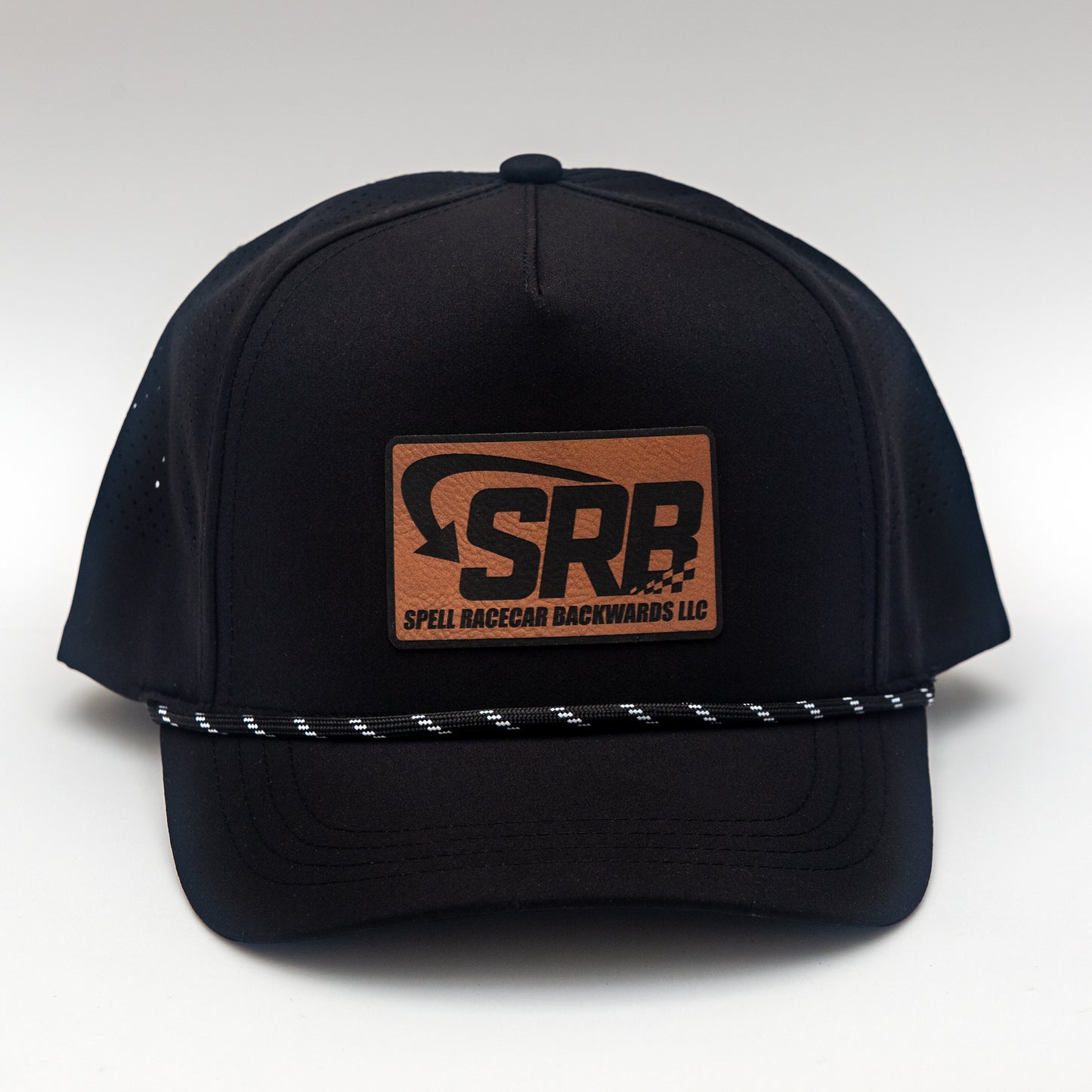 black baseball hat with "SRB" on leather patch on white background